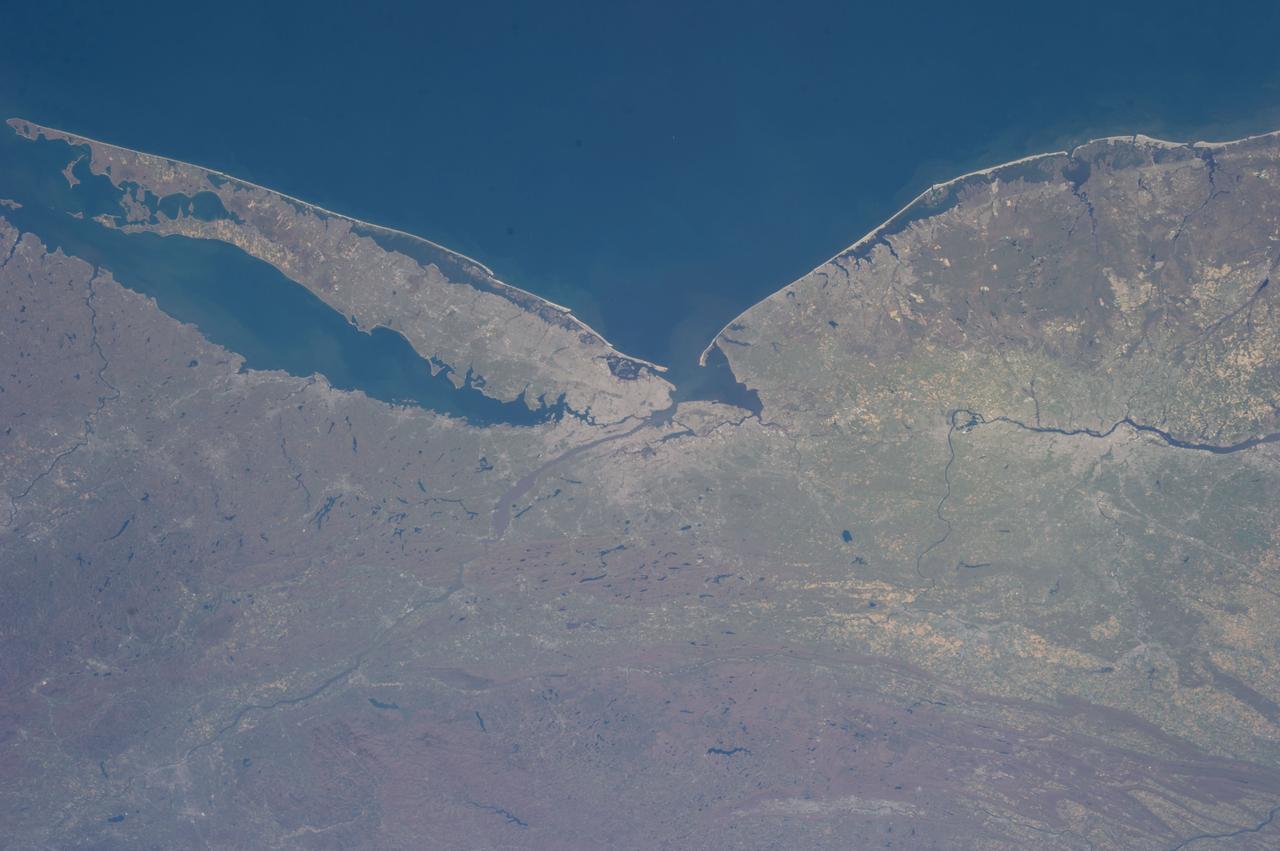ISS035-E-034029 (2 May 2013) --- One of the Expedition 35 crew members aboard the International Space Station recorded this image featuring parts of the Northeast. Long Island, New York is the most conspicuous tell-tale feature, which juts out into the Atlantic Ocean. The entire length of Long Island is visible from Lower Bay to Block Island Sound. According to geologists, the origin and shape of Long Island are due to continental collision and glaciers that once dominated the landscape. The metropolitan area of New York City is complete within the photo, near frame center. Parts of Connecticut and New Jersey are also visible in the scene.