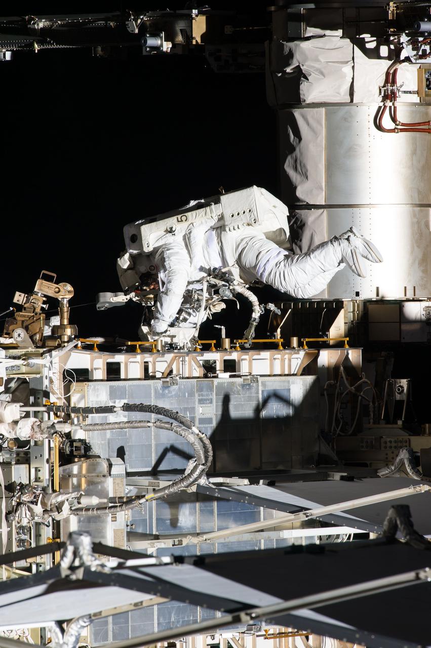 ISS035-E-036825 (11 May 2013) --- Expedition 35 Flight Engineers Tom Marshburn (pictured) and Chris Cassidy (out of frame) completed a space walk at 2:14 p.m. EDT May 11 to inspect and replace a pump controller box on the International Space Station?s far port truss (P6) leaking ammonia coolant. The two NASA astronauts began the 5-hour, 30-minute space walk at 8:44 a.m.