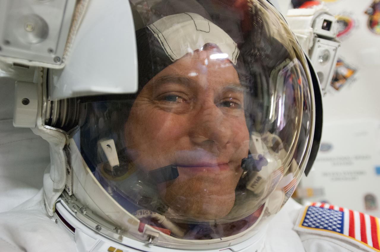 ISS035-E-036840 (11 May 2013) --- Expedition 35 Flight Engineer Tom Marshburn is captured in a close-up image in the Quest Airlock of the International Space Station prior to a space walk which he shared with Flight Engineer Chris Cassidy (out of frame). The NASA astronauts completed the space walk at 2:14 p.m. EDT May 11 to inspect and replace a pump controller box on the International Space Station’s far port truss (P6) leaking ammonia coolant. The pair began the 5-hour, 30-minute space walk at 8:44 a.m.