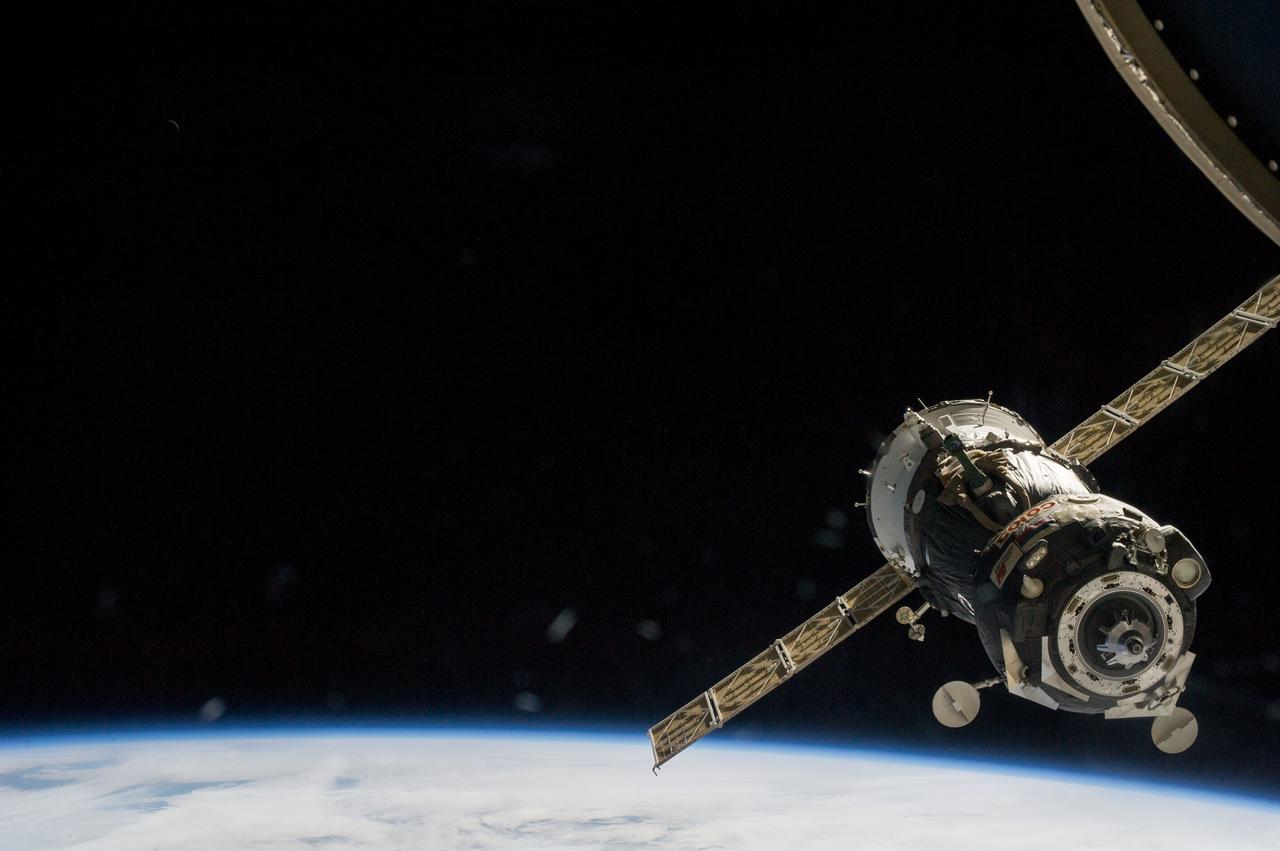 ISS036-E-000041 (13 May 2013) --- From inside the International Space Station, the departing Soyuz TMA-07M was recorded by one of three Expedition 36 crew members on May 13, 2013.  Onboard the Soyuz were Expedition 35 commander Chris Hadfield of the Canadian Space Agency,   NASA astronaut Tom Marshburn and Russian cosmonaut Roman Romanenko, both Expedition 35 flight engineers.  Romanenko served as Soyuz commander.  Onboard the orbital outpost were  Expedition 36 crew members --- Commander Pavel Vinogradov of the Russian Federal Space Agency (Roscosmos), NASA astronaut Chris Cassidy and Russian cosmonaut Alexander Misurkin, both flight engineers.