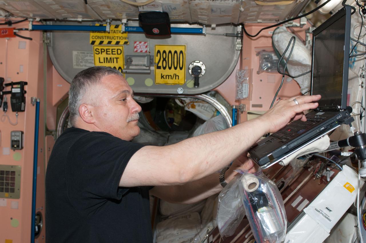 ISS036-E-005323 (30 May 2013) --- Russian cosmonaut Fyodor Yurchikhin, Expedition 36 flight engineer and assigned Expedition 37 commander, enters data on a computer in the Unity node aboard the Earth-orbiting International Space Station.