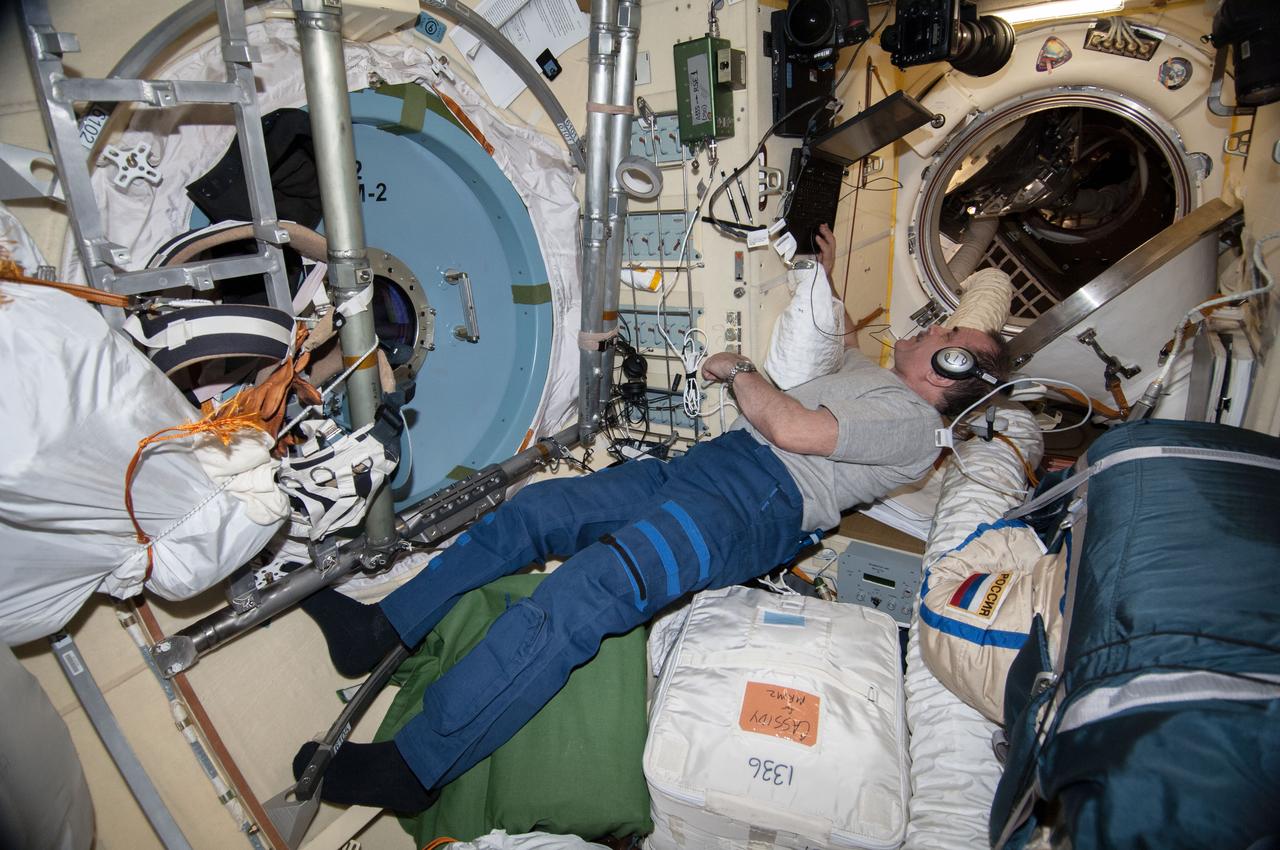 ISS036-E-011305 (24 June 2013) --- Russian cosmonaut Pavel Vinogradov, Expedition 36 commander, uses a computer in the Poisk Mini-Research Module 2 (MRM2) of the International Space Station.