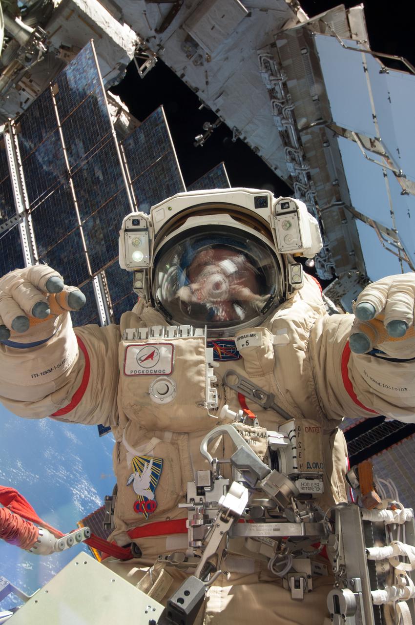 ISS036-E-011480 (24 June 2013) --- Russian cosmonaut Fyodor Yurchikhin, Expedition 36 flight engineer, participates in a session of extravehicular activity (EVA) as work continues on the International Space Station. During the six-hour, 34-minute spacewalk, Yurchikhin and Russian cosmonaut Alexander Misurkin (out of frame), Expedition 36 flight engineer, replaced an aging fluid flow control panel on the station's Zarya module as preventative maintenance on the cooling system for the Russian segment of the station. They also installed clamps for future power cables as an early step toward swapping the Pirs airlock with a new multipurpose laboratory module. The Russian Federal Space Agency plans to launch a combination research facility, airlock and docking port late this year on a Proton rocket. Yurchikhin and Misurkin also retrieved two science experiments and installed a new one.