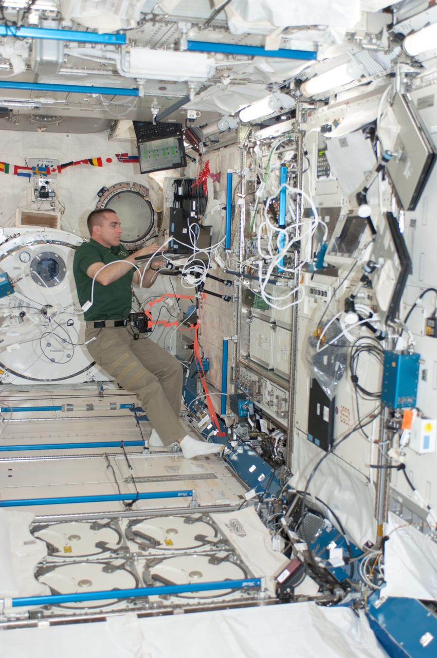 ISS036-E-015510 (5 July 2013) --- NASA astronaut Chris Cassidy, Expedition 36 flight engineer, uses a computer in the Kibo laboratory of the International Space Station.