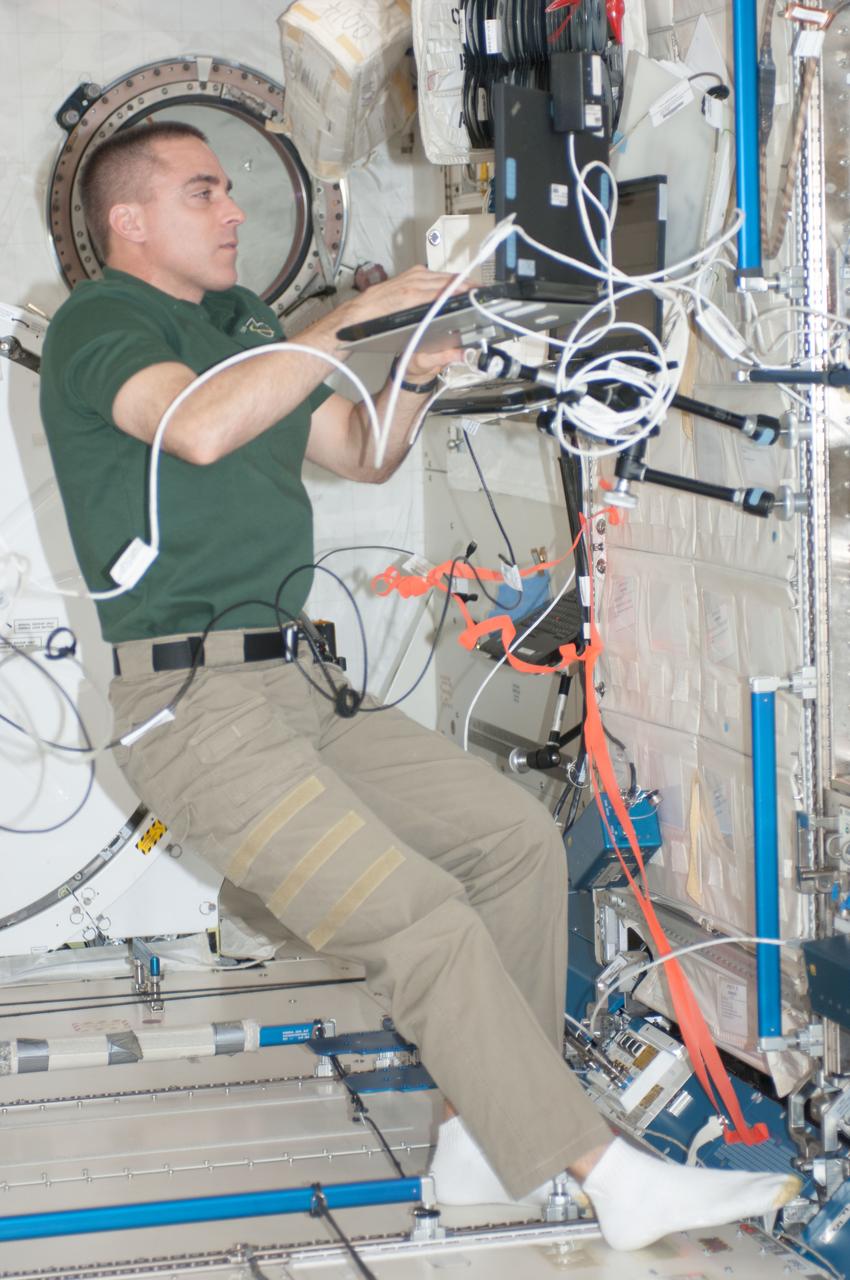 ISS036-E-015511 (5 July 2013) --- NASA astronaut Chris Cassidy, Expedition 36 flight engineer, uses a computer in the Kibo laboratory of the International Space Station.