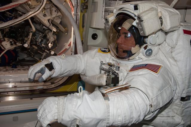 NASA image: EVA 23 prep in the Quest airlock