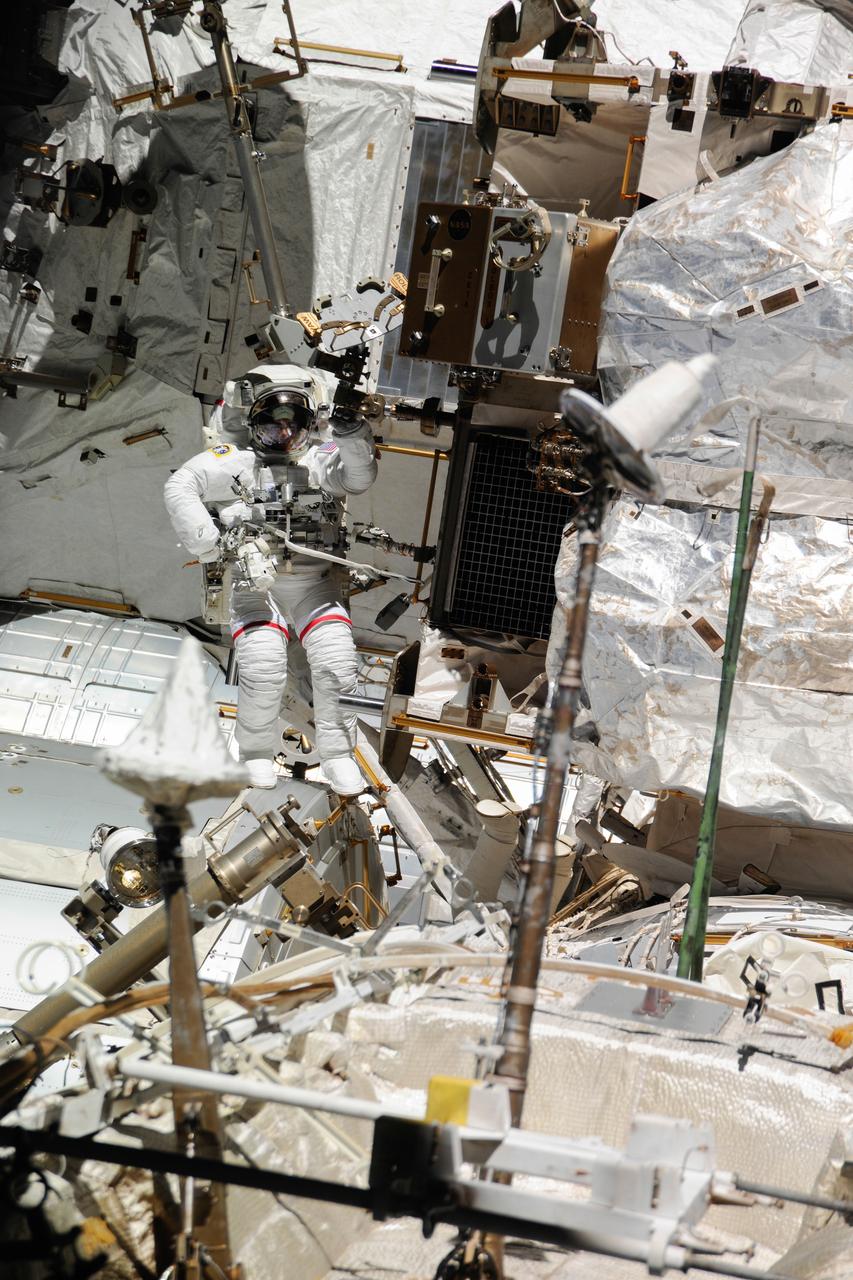ISS036-E-020926 (16 July 2013) --- NASA astronaut Chris Cassidy, Expedition 36 flight engineer, attired in an Extravehicular Mobility Unit (EMU) spacesuit, participates in a session of extravehicular activity (EVA) as work continues on the International Space Station. A little more than one hour into the spacewalk, European Space Agency astronaut Luca Parmitano (out of frame) reported water floating behind his head inside his helmet. The water was not an immediate health hazard for Parmitano, but Mission Control decided to end the spacewalk early.