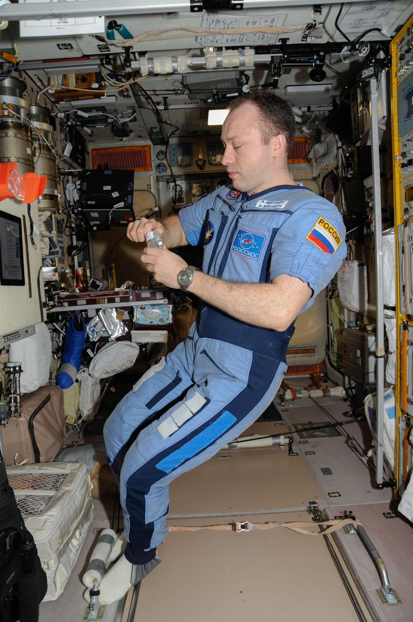 ISS036-E-025446 (29 July 2013) --- Russian cosmonaut Alexander Misurkin, Expedition 36 flight engineer, works on various science and maintenance activities in the Zvezda Service Module of the International Space Station.