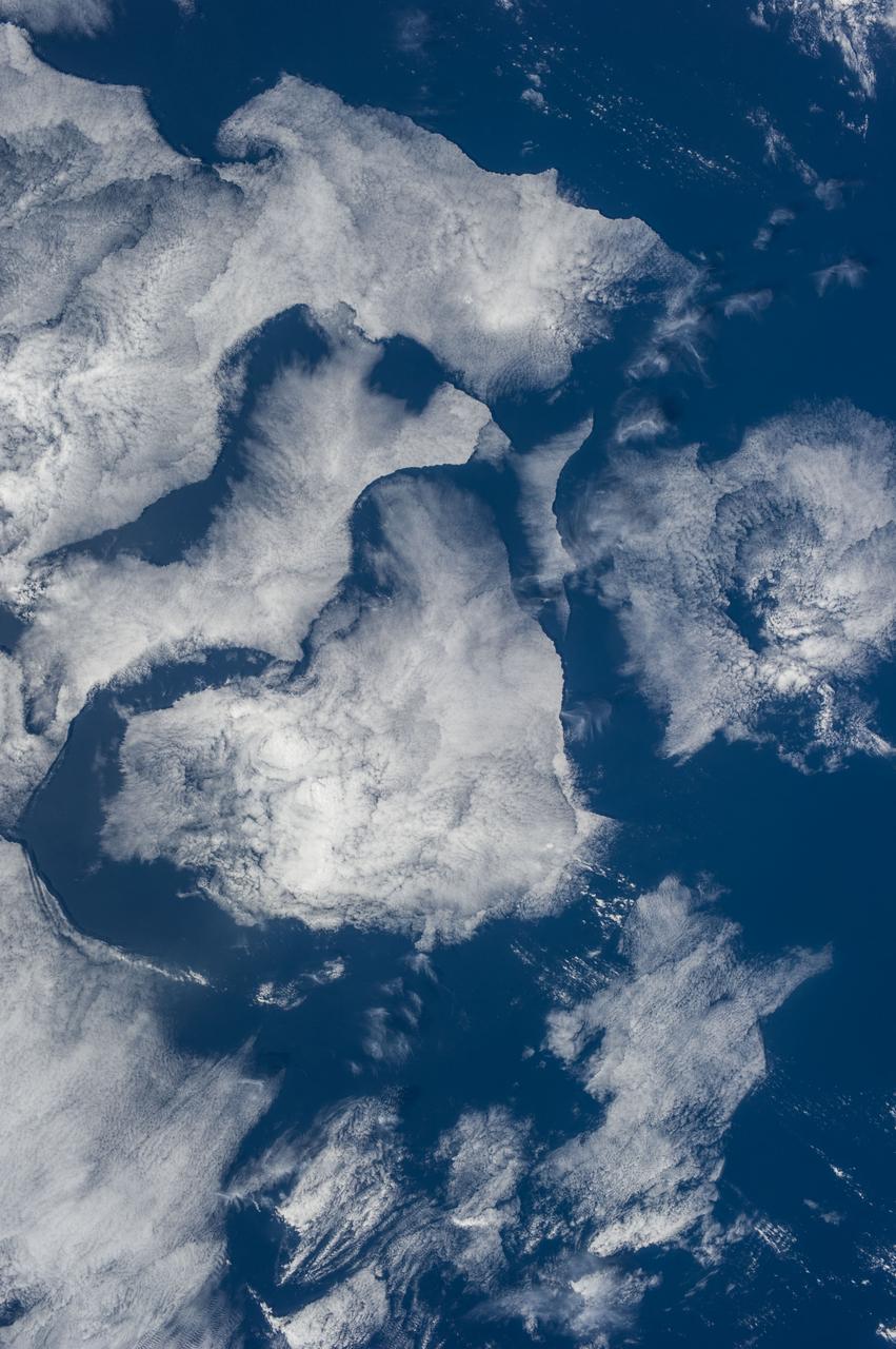 Earth observation taken during day pass by an Expedition 36 crew member on board the International Space Station (ISS). Per Twitter message: Cloud gazing over the Pacific Ocean. Hearts?