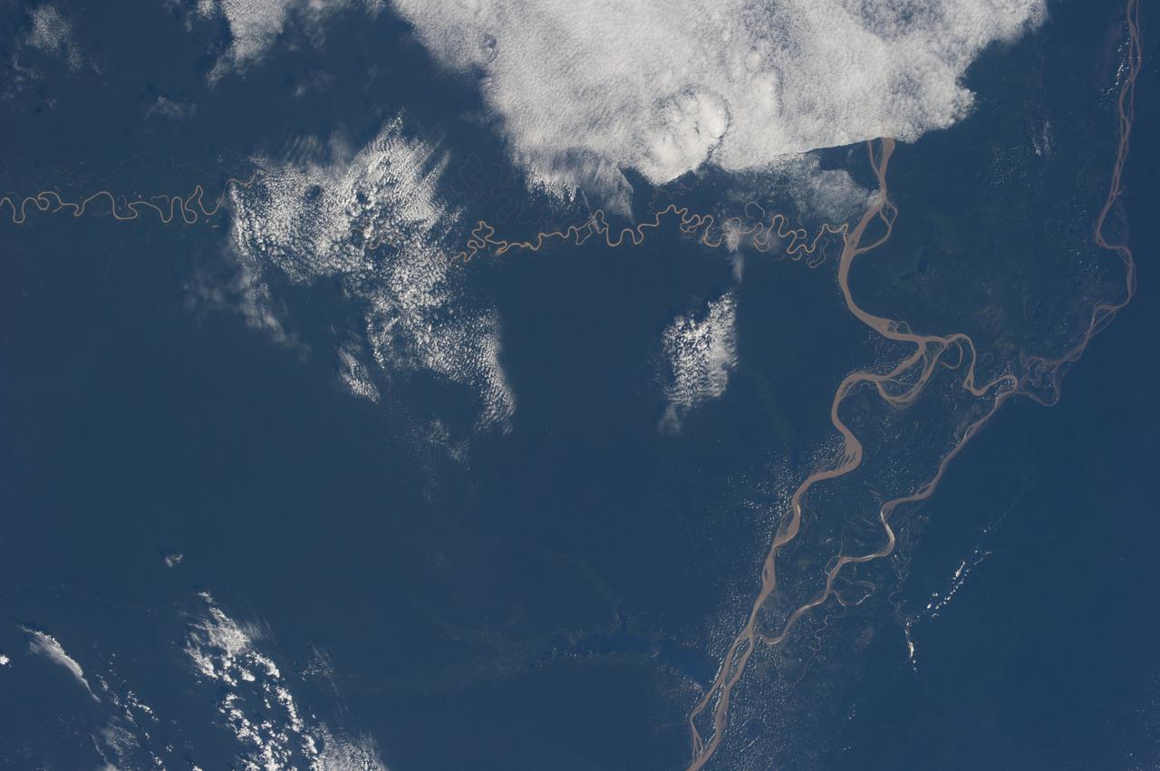 Earth observation taken during day pass by an Expedition 36 crew member on board the International Space Station (ISS). Per Twitter message: Amazing rivers in Brazil.