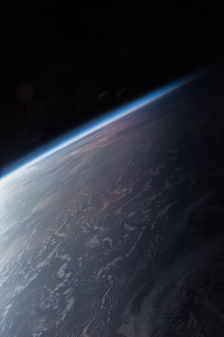 Earth observation taken during a night pass by an Expedition 36 crew member on board the International Space Station (ISS). Per Twitter message: Day turns to night at the terminator.