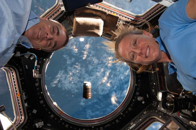 NASA image: Cassidy and Nyberg in Cupola during HTV-4 approach