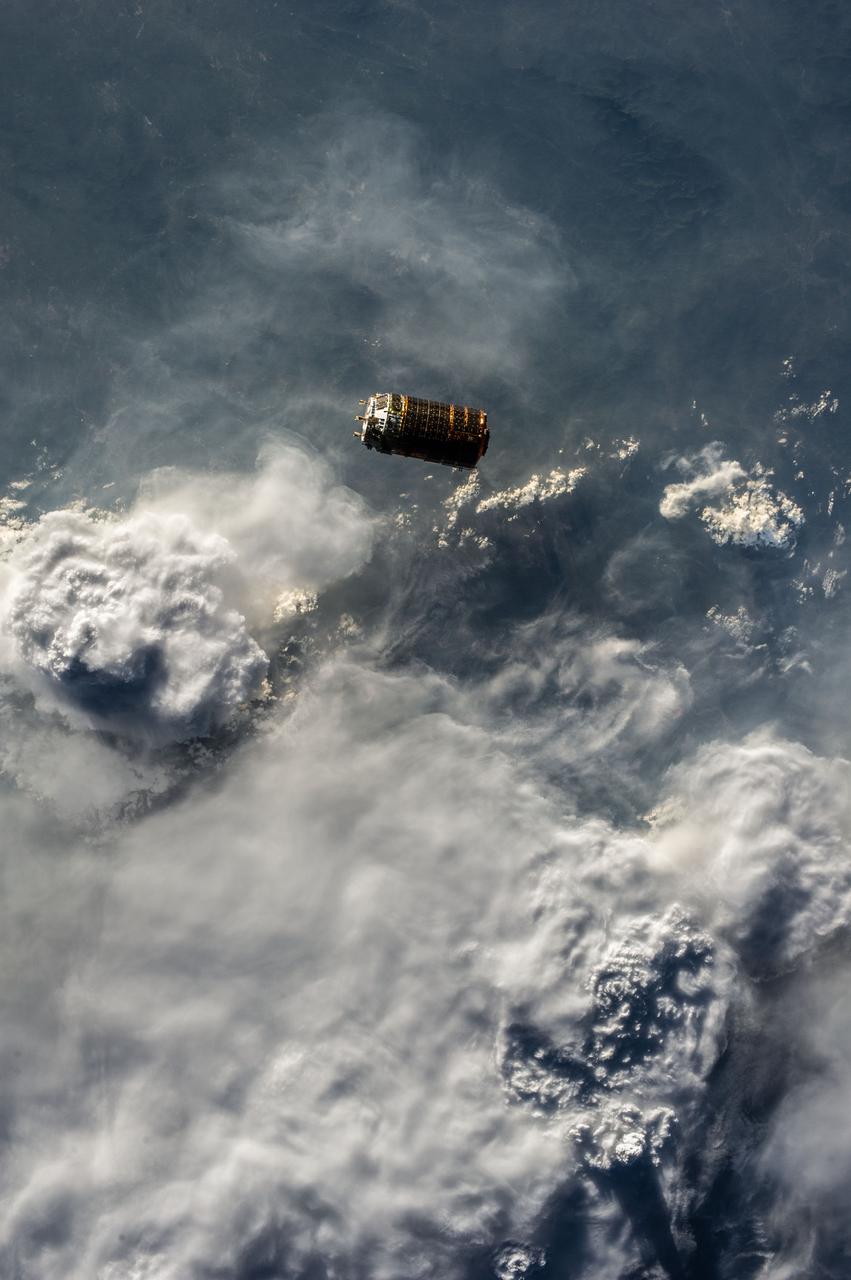 ISS036-E-030638 (9 Aug. 2013) --- The unpiloted Japanese "Kounotori" H2 Transfer Vehicle-4 (HTV-4) approaches the International Space Station. The HTV, a 33-foot-long, 13-foot-diameter unmanned cargo transfer spacecraft, is delivering 3.6 tons of science experiments, equipment and supplies to the orbiting complex. HTV-4 launched from the Tanegashima Space Center in southern Japan on Aug.3 at 3:48 p.m. (Aug. 4 at 4:48 a.m., Japan time). A blue and white part of Earth provides the backdrop for the scene.