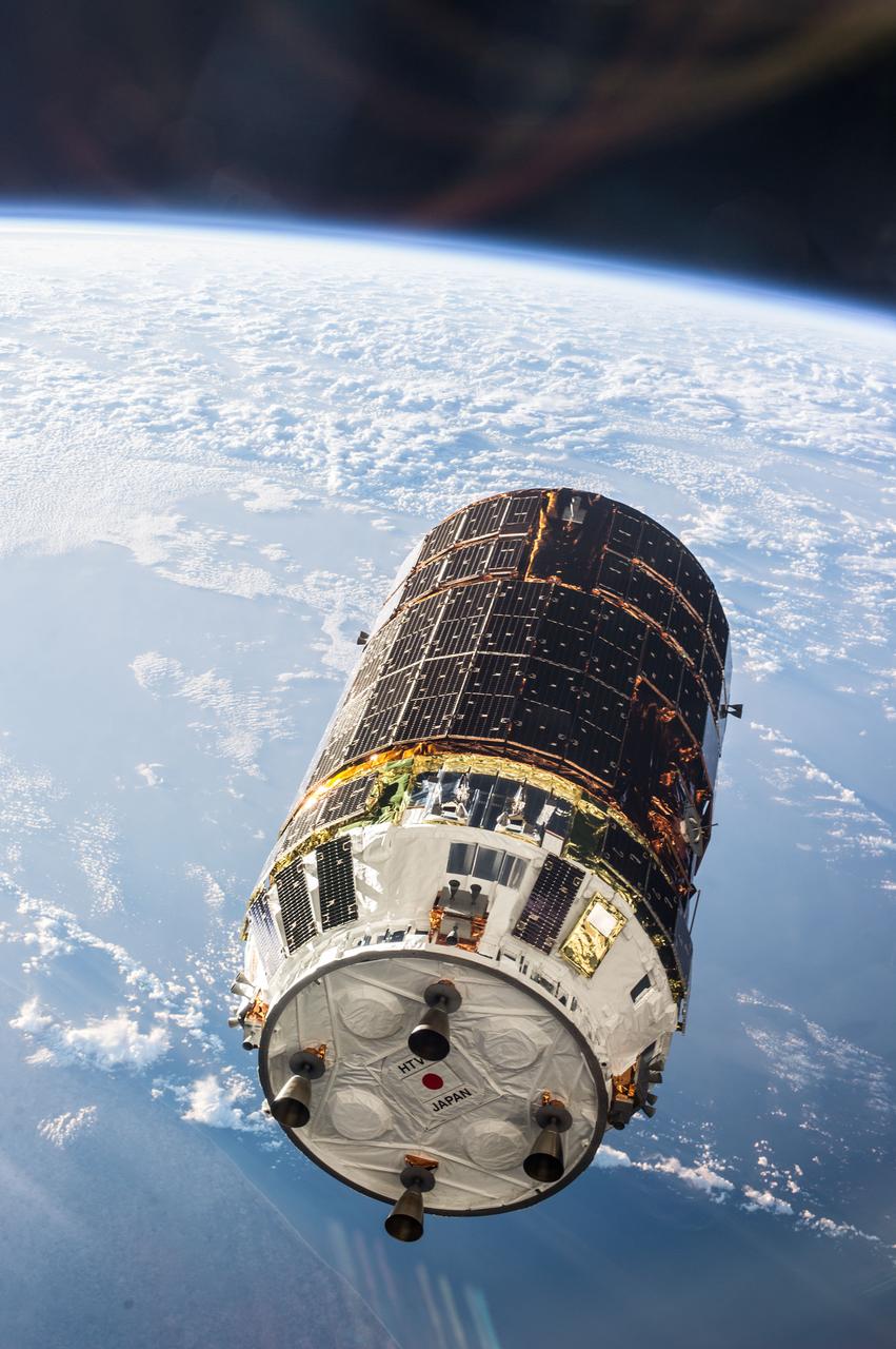 ISS036-E-030702 (9 Aug. 2013) --- The unpiloted Japanese "Kounotori" H2 Transfer Vehicle-4 (HTV-4) approaches the International Space Station. The HTV, a 33-foot-long, 13-foot-diameter unmanned cargo transfer spacecraft, is delivering 3.6 tons of science experiments, equipment and supplies to the orbiting complex. HTV-4 launched from the Tanegashima Space Center in southern Japan on Aug.3 at 3:48 p.m. (Aug. 4 at 4:48 a.m., Japan time). A blue and white part of Earth provides the backdrop for the scene.