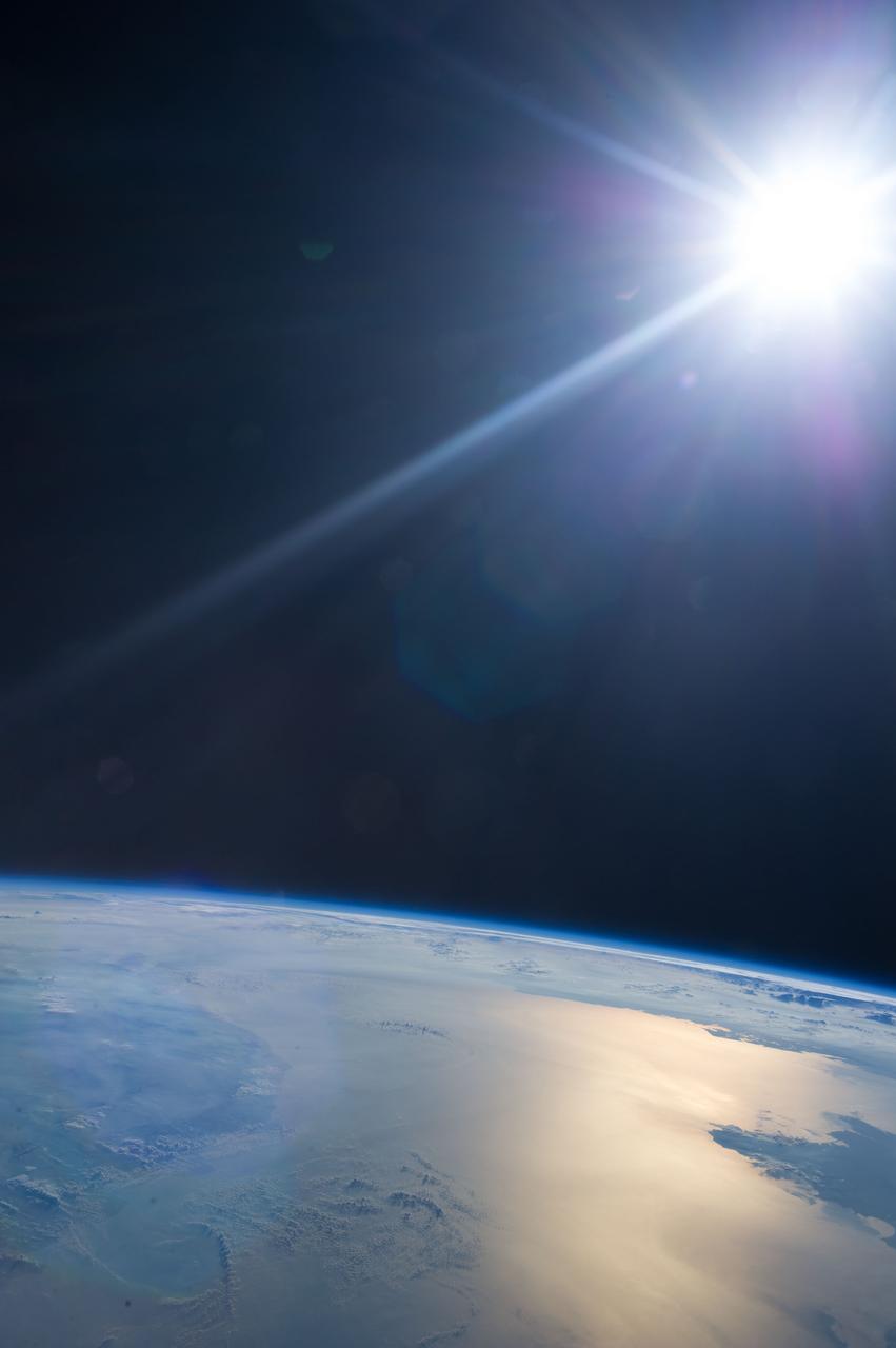 Earth observation taken during day pass by an Expedition 36 crew member on board the International Space Station (ISS). Per Twitter message: Just another sunset...