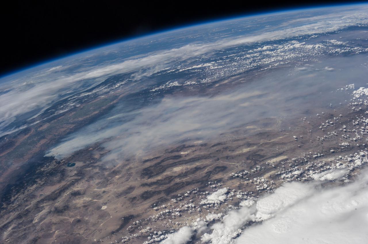 ISS036-E-035683 (24 Aug. 2013) --- One of the Expedition 36 crew members aboard the International Space Station used a 50mm lens to record this image of massive wildfires in and around California's Yosemite National Park on Aug. 24.