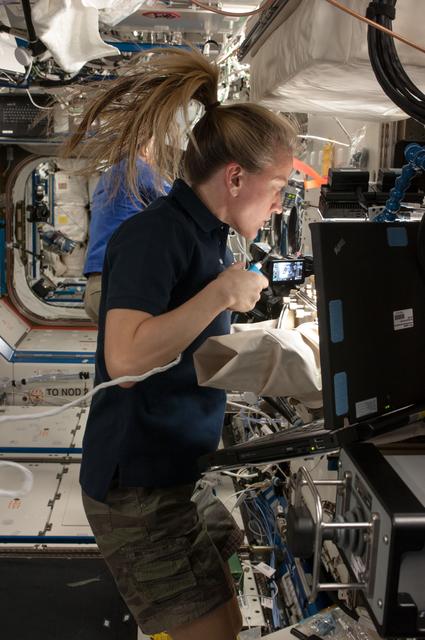 NASA image: Nyberg working with ACE in U.S. Laboratory