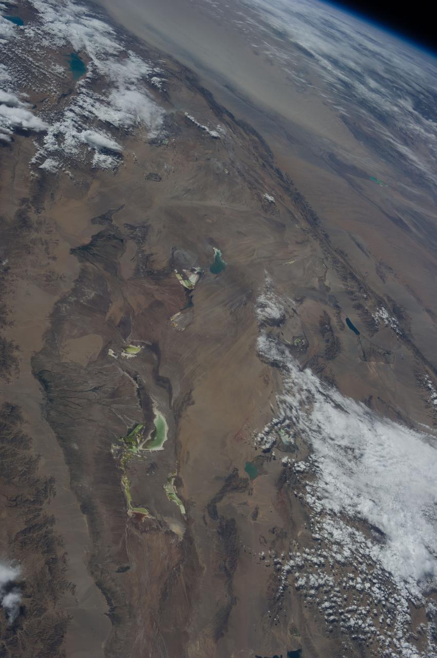 Earth observation taken during day pass by an Expedition 36 crew member on board the International Space Station (ISS). Per Twitter message: Qinghai Province, western China.