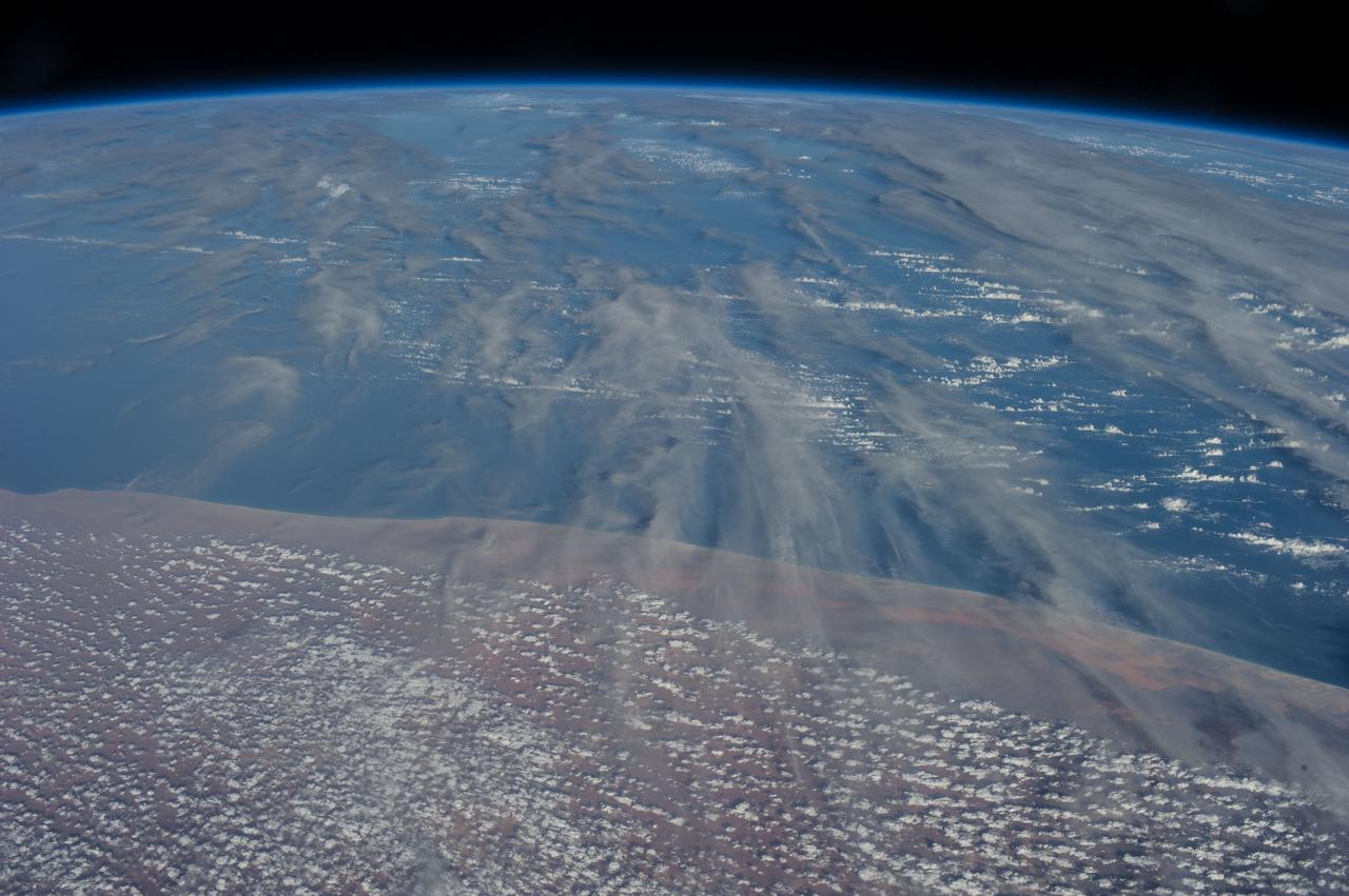 Earth observation taken during a day pass by an Expedition 36 crew member on board the International Space Station (ISS).  Per Twitter message: Coast of Somalia on the Indian Ocean.