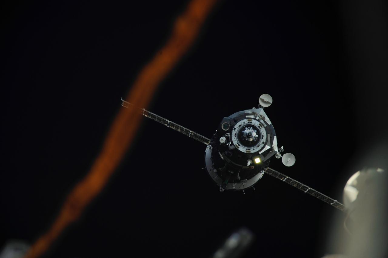 ISS037-E-000007 (10 Sept. 2013) --- The Soyuz TMA-08M spacecraft departs from the International Space Station?s Poisk Mini-Research Module 2 (MRM2) and heads toward a landing in a remote area near the town of Zhezkazgan, Kazakhstan, on Sept. 11, 2013 (Kazakhstan time). Russian cosmonaut Pavel Vinogradov, Expedition 36 commander; along with NASA astronaut Chris Cassidy and Russian cosmonaut Alexander Misurkin, both flight engineers, are ending a five-and-a-half month stay at the space station where they served as members of the Expedition 35 and 36 crews.