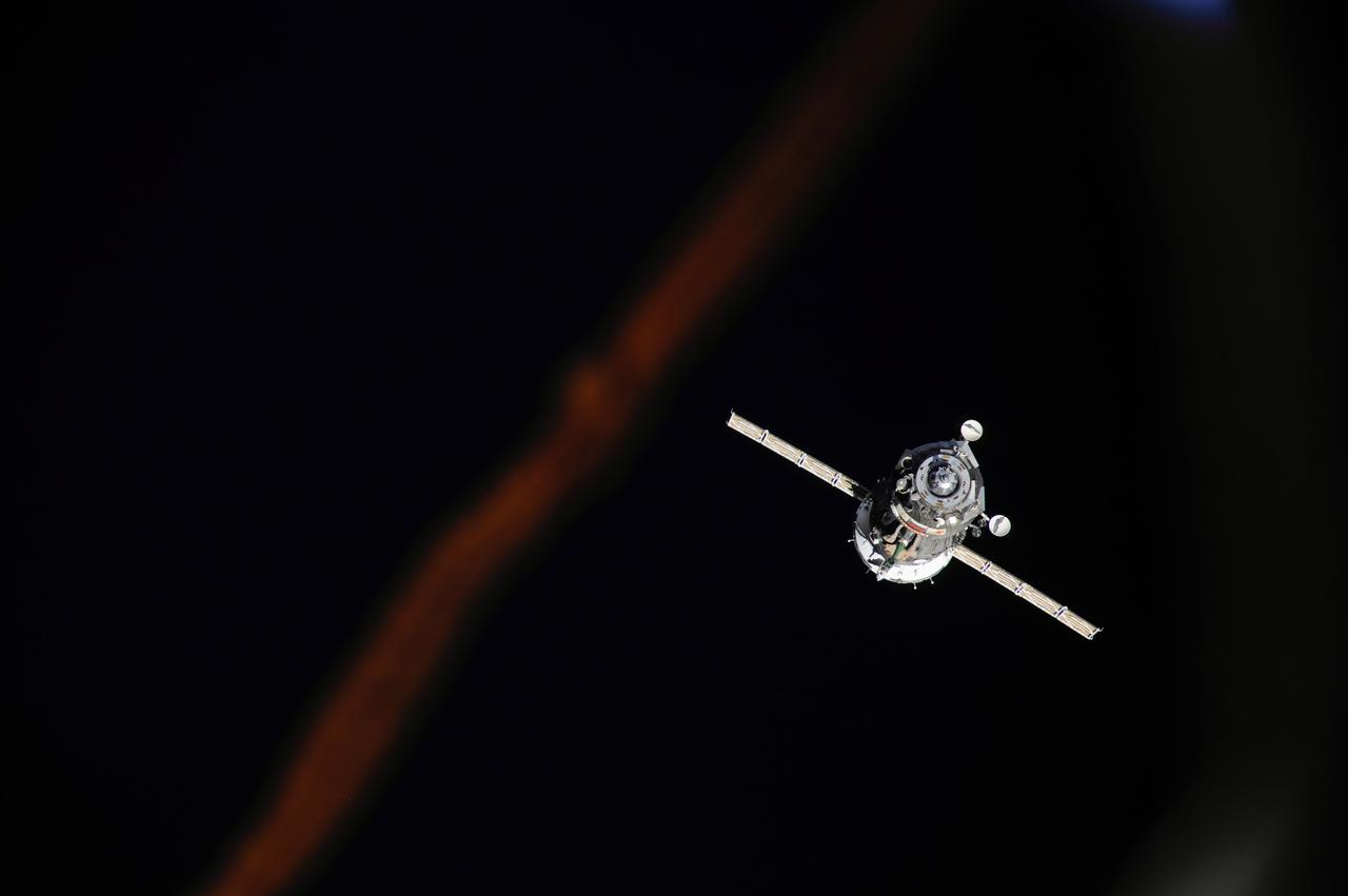 ISS037-E-000014 (10 Sept. 2013) --- The Soyuz TMA-08M spacecraft departs from the International Space Station?s Poisk Mini-Research Module 2 (MRM2) and heads toward a landing in a remote area near the town of Zhezkazgan, Kazakhstan, on Sept. 11, 2013 (Kazakhstan time). Russian cosmonaut Pavel Vinogradov, Expedition 36 commander; along with NASA astronaut Chris Cassidy and Russian cosmonaut Alexander Misurkin, both flight engineers, are ending a five-and-a-half month stay at the space station where they served as members of the Expedition 35 and 36 crews.