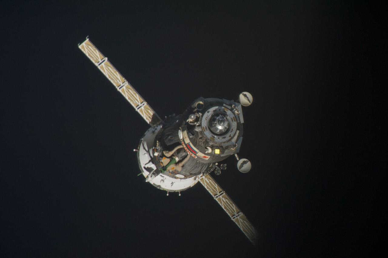 ISS037-E-000022 (10 Sept. 2013) --- The Soyuz TMA-08M spacecraft departs from the International Space Station?s Poisk Mini-Research Module 2 (MRM2) and heads toward a landing in a remote area near the town of Zhezkazgan, Kazakhstan, on Sept. 11, 2013 (Kazakhstan time). Russian cosmonaut Pavel Vinogradov, Expedition 36 commander; along with NASA astronaut Chris Cassidy and Russian cosmonaut Alexander Misurkin, both flight engineers, are ending a five-and-a-half month stay at the space station where they served as members of the Expedition 35 and 36 crews.