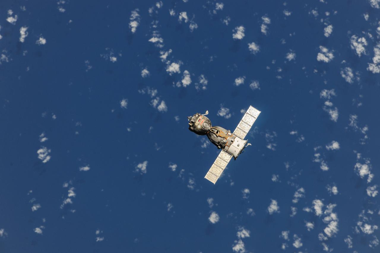ISS037-E-000034 (10 Sept. 2013) --- The Soyuz TMA-08M spacecraft departs from the International Space Station?s Poisk Mini-Research Module 2 (MRM2) and heads toward a landing in a remote area near the town of Zhezkazgan, Kazakhstan, on Sept. 11, 2013 (Kazakhstan time). Russian cosmonaut Pavel Vinogradov, Expedition 36 commander; along with NASA astronaut Chris Cassidy and Russian cosmonaut Alexander Misurkin, both flight engineers, are ending a five-and-a-half month stay at the space station where they served as members of the Expedition 35 and 36 crews.