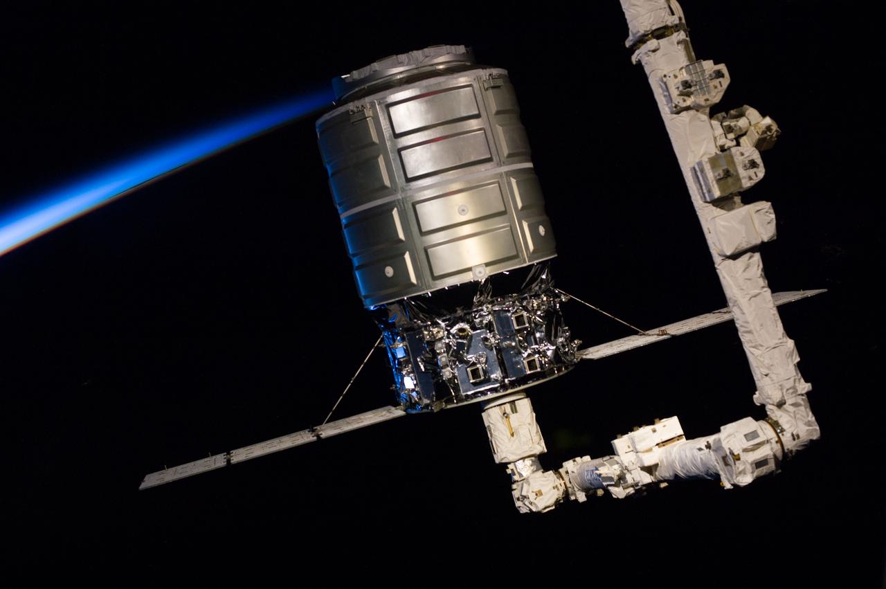 "View of the capture of the first Cygnus commercial cargo spacecraft built by Orbital Sciences Corp attached to the end of the robotic arm (AKA Canadarm2) on the International Space Station after the two spacecraft converged at 7:01 a.m. EDT on Sept. 29, 2013. " Also sent as Twitter message.