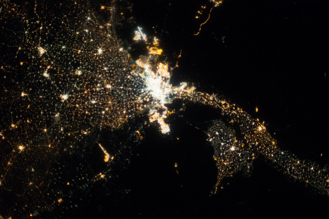 "Earth observation taken during a night pass by the Expedition 37 crew. Folder lists this as Cairo, Tel-Aviv, at night. " Per Twitter message this is Cairo and the Nile Delta.