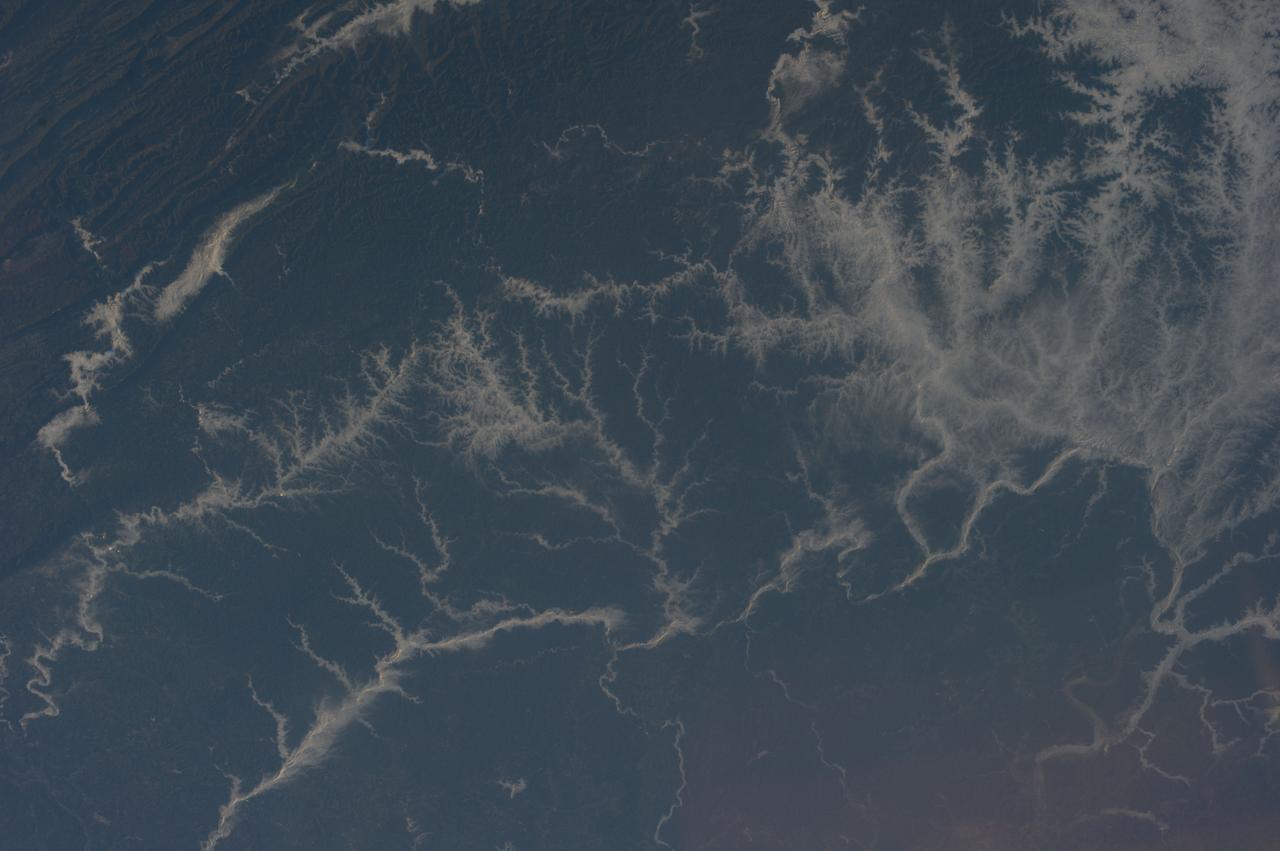 Earth observation taken during a day pass by the Expedition 37 crew.  Per Twitter message: Early morning fog in the river valleys of Ohio and West Virginia.