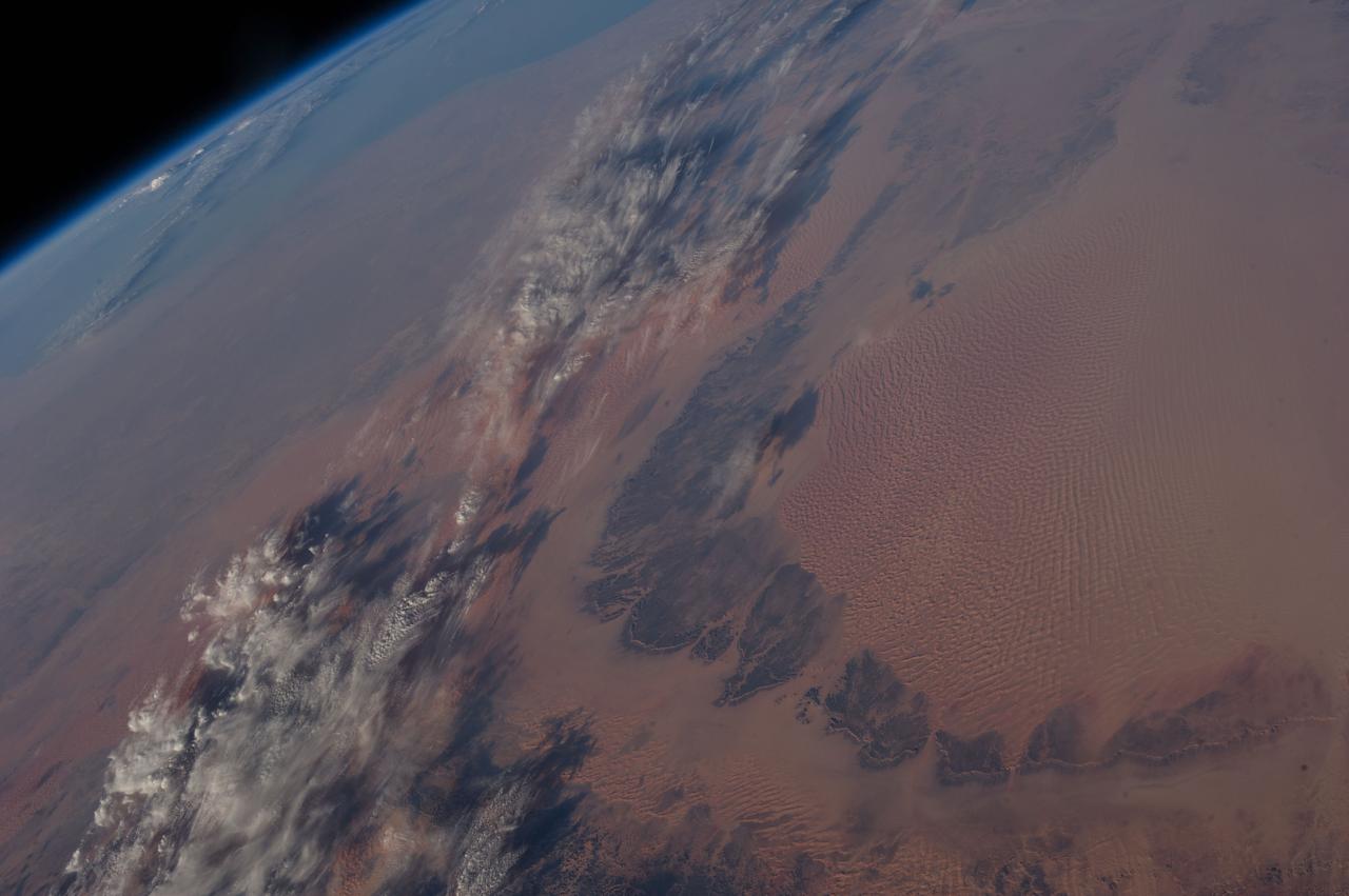 Earth observation taken during a day pass by the Expedition 37 crew. Per Twitter message: Southwest Libya to the Mediterranean coast.