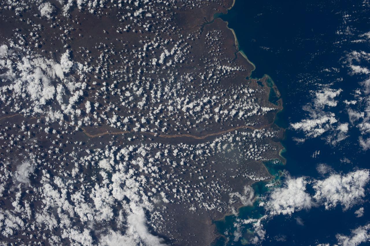 Earth observation taken during a day pass by the Expedition 37 crew. Per Twitter message: Ruvuma River,  Tanzania and Mozambique.