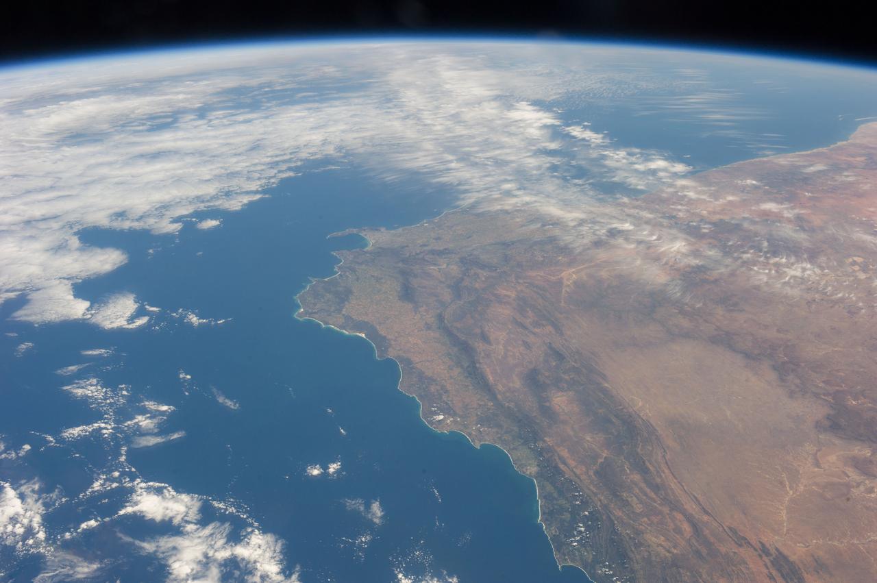 Earth observation taken during a day pass by the Expedition 37 crew. Per Twitter message: The tip of Africa.