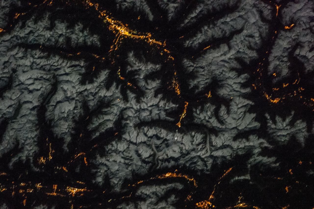 Earth observation taken during a night pass by the Expedition 37 crew. City lights are visible.
