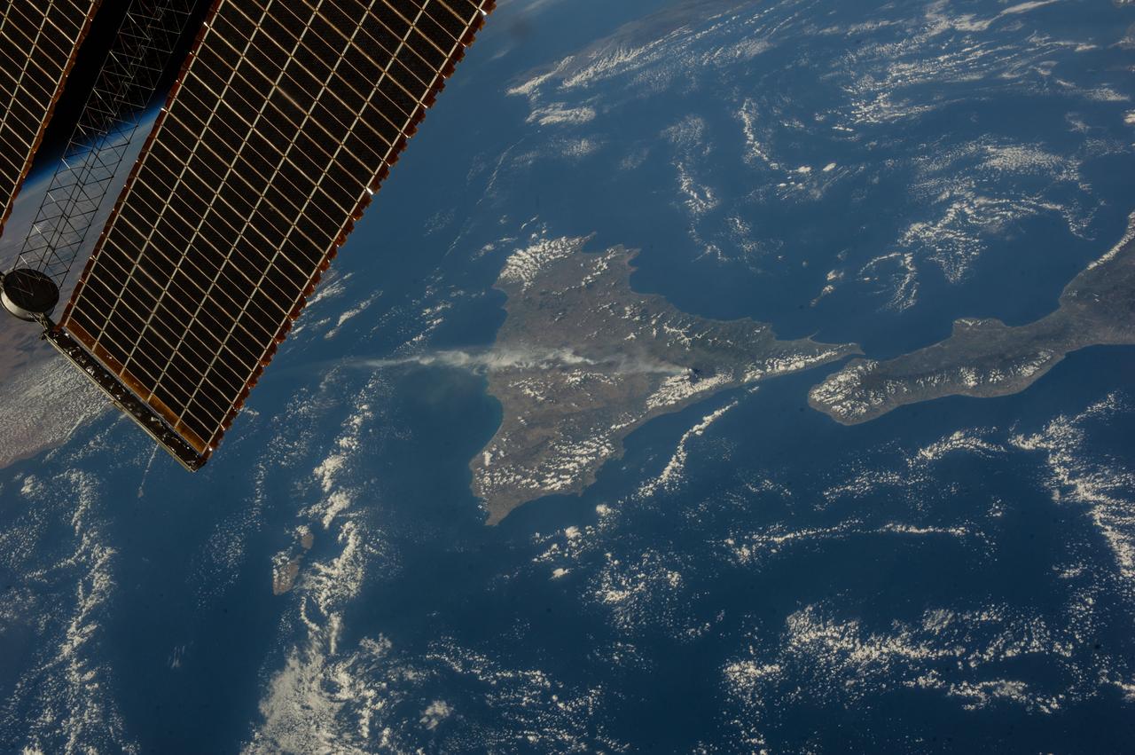 Earth observation taken during day pass by an Expedition 37 crew member on board the International Space Station (ISS).   Folder lists this as CEO Etna erupting. Image was sent down also as Twitter message.