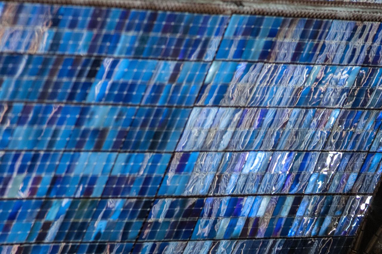 View of FGB solar array panels taken during Russian extravehicular activity (EVA) 36 in support of assembly and maintenance on the International Space Station.