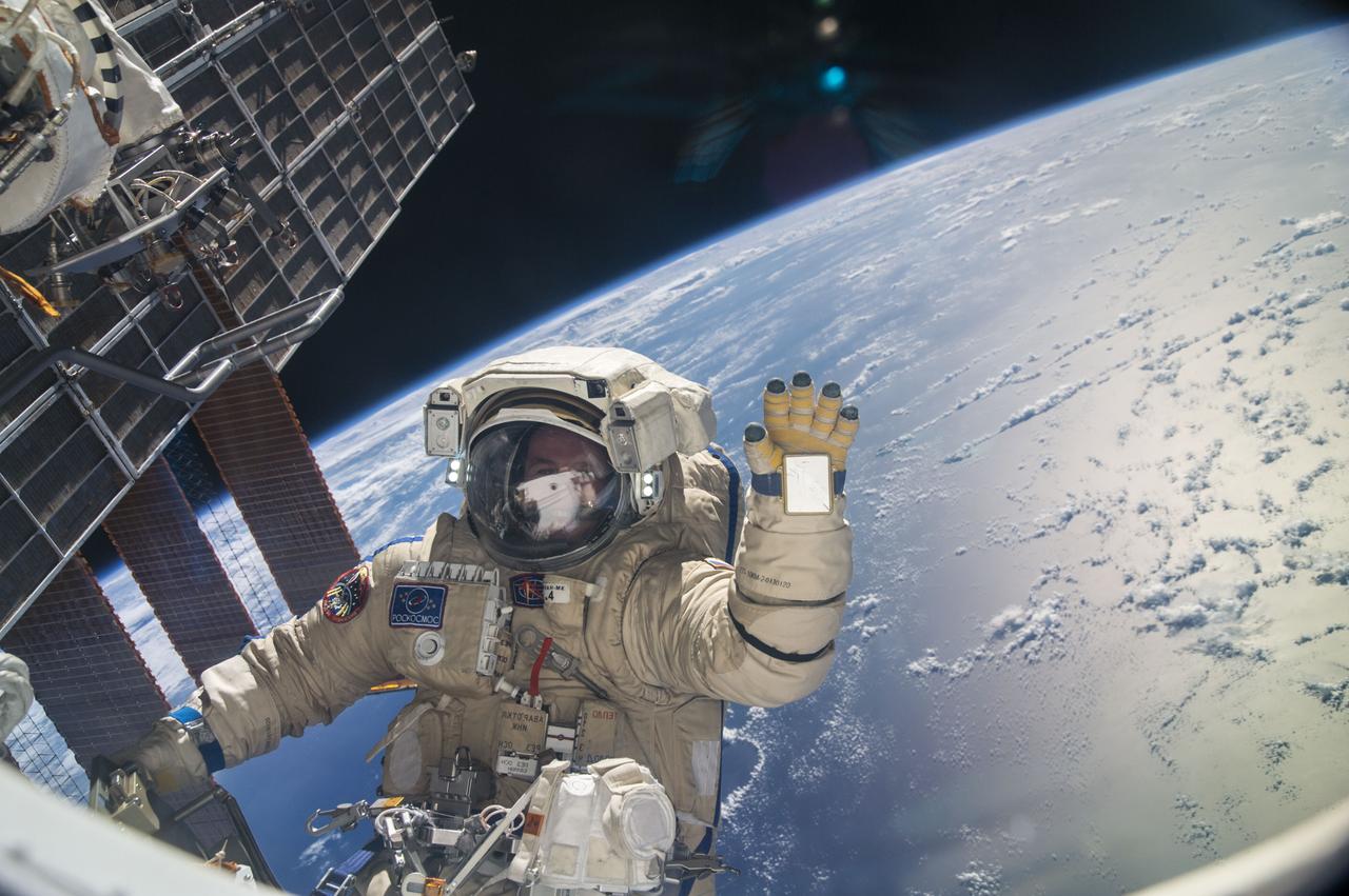 ISS037-E-028789 (9 Nov. 2013) --- Russian cosmonaut Sergey Ryazanskiy, Expedition 37 flight engineer, attired in a Russian Orlan spacesuit, is pictured during a session of extravehicular activity (EVA) in support of assembly and maintenance on the International Space Station. During the five-hour, 50-minute spacewalk, Ryazanskiy and Russian cosmonaut Oleg Kotov (out of frame) continued the setup of a combination EVA workstation and biaxial pointing platform that was installed during an Expedition 36 spacewalk on Aug. 22. Earth’s horizon and the blackness of space provide the backdrop for the scene.