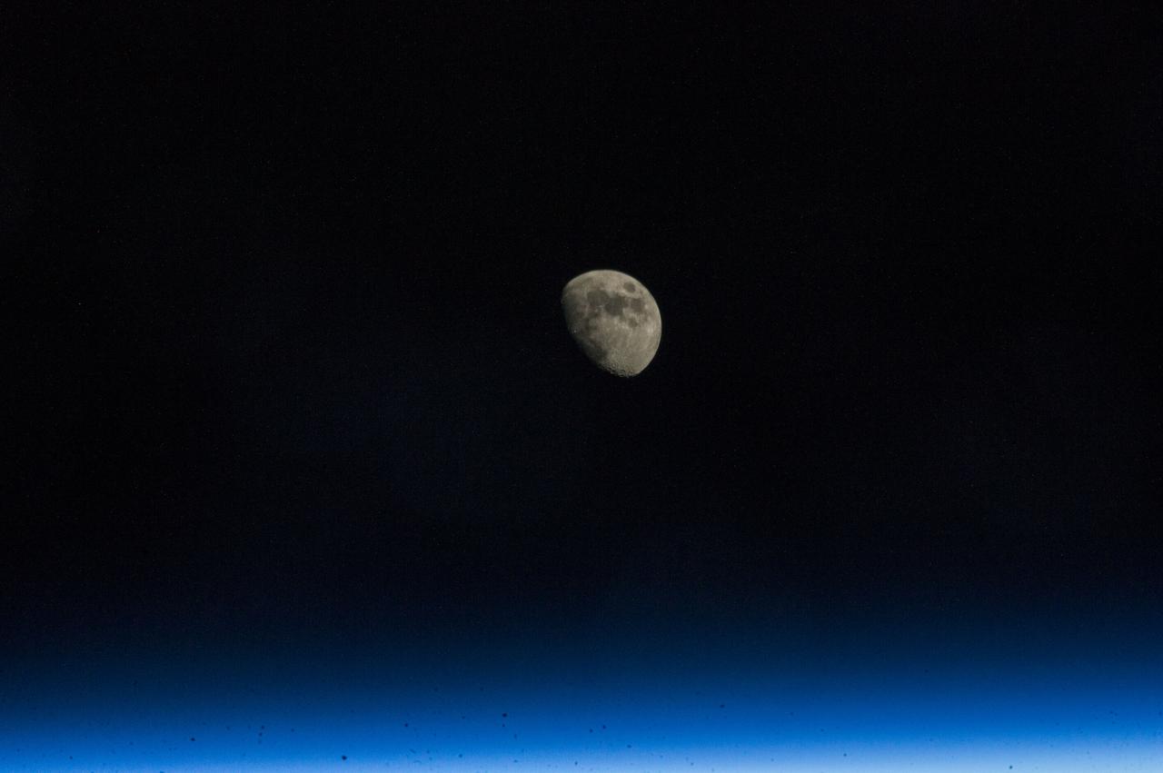 ISS038-E-000649 (12 Nov. 2013) --- Although crew members on the International Space Station view literally hundreds of scenes of the moon rising and setting over Earth on each several- month increment, the home planet's natural satellite never ceases to escape the crew's attention and impulse to grab a camera from time to time. Such was the case with this image of a waxing gibbous moon recorded exactly at 00:00:00 GMT, Nov. 12, 2013.