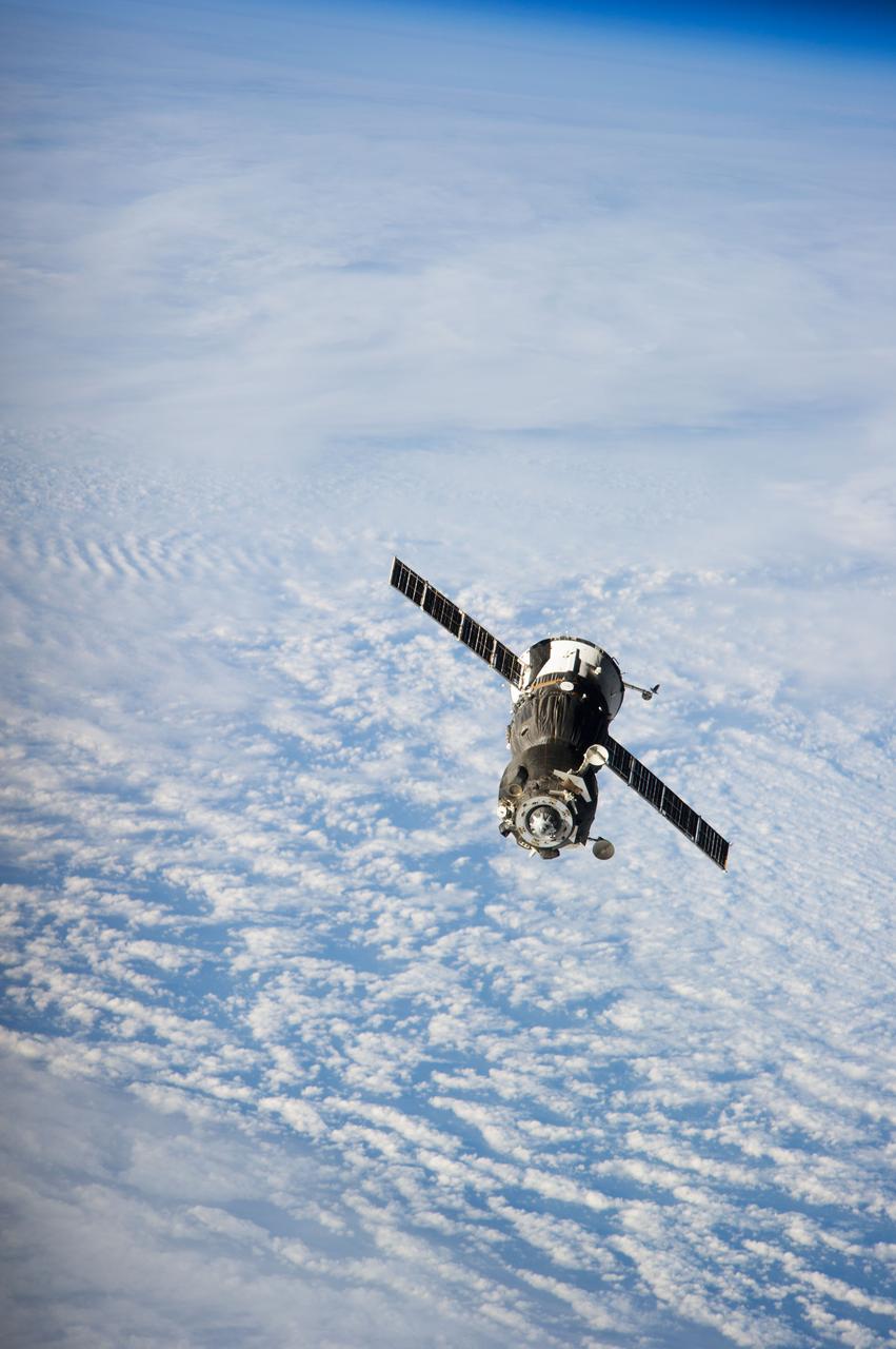 ISS038-E-001139 (10 Nov. 2013) --- The Soyuz TMA-09M spacecraft departs from the International Space Station?s Zvezda Service Module and heads toward a landing near the town of Zhezkazgan, Kazakhstan on Nov. 11, 2013 (Kazakh time). Russian cosmonaut Fyodor Yurchikhin, Expedition 37 commander; along with NASA astronaut Karen Nyberg and European Space Agency astronaut Luca Parmitano, both flight engineers, are ending a five-and-a-half month stay at the space station where they served as members of the Expedition 36 and 37 crews.