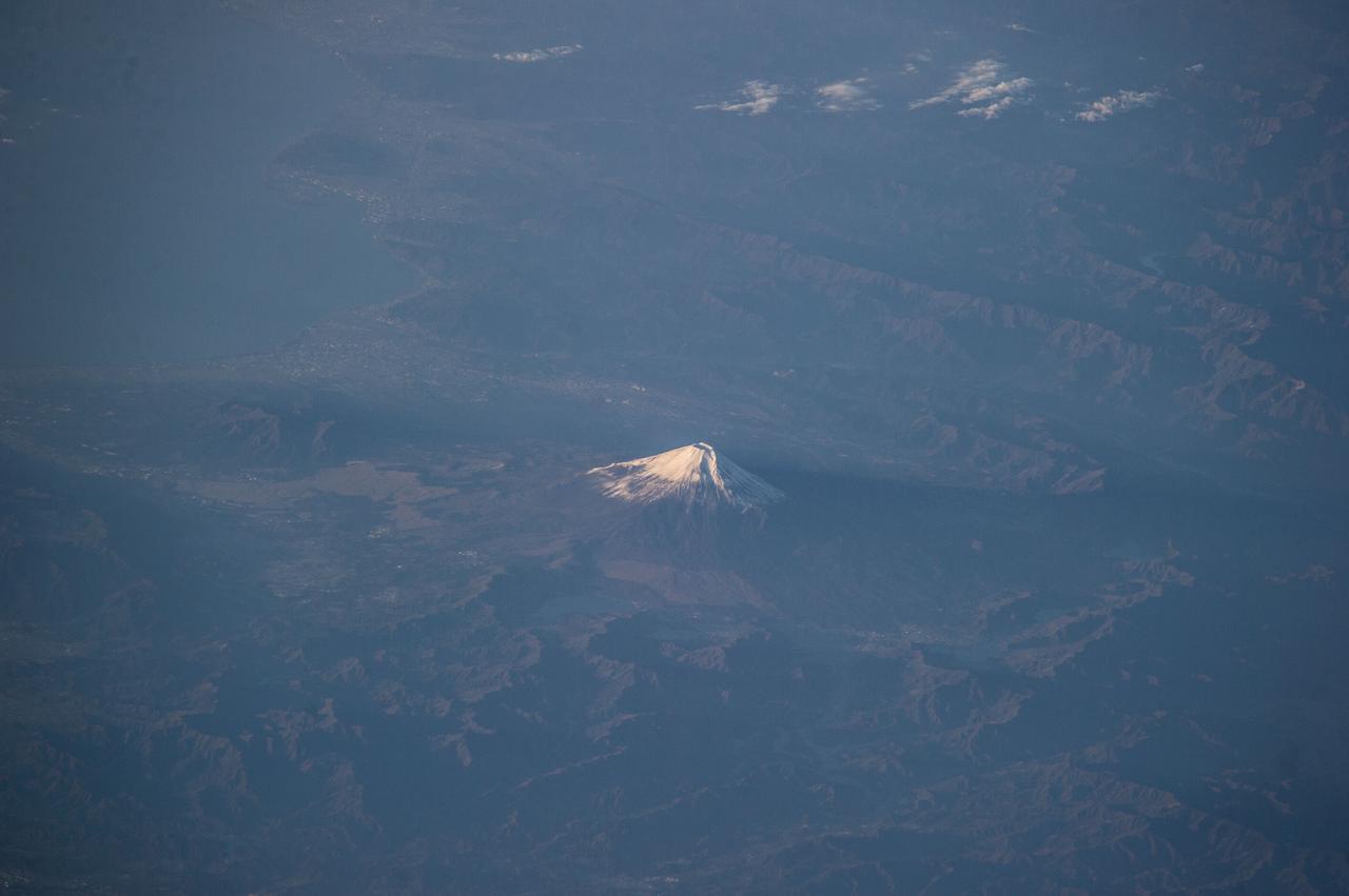 Earth observations taken by Expedition 38 crewmember.  Crewmember indicates Mt Fuji,Japan,at sunrise.  Image was released by astronaut on Twitter.