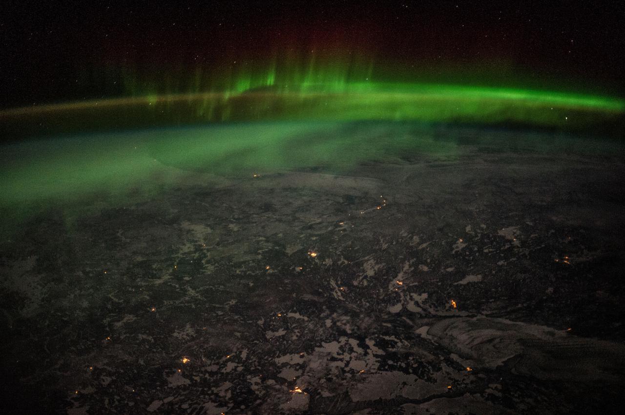 Earth observations taken by Expedition 38 crewmember.  Aurora over Canada is visible.  Image was released by astronaut on Twitter.