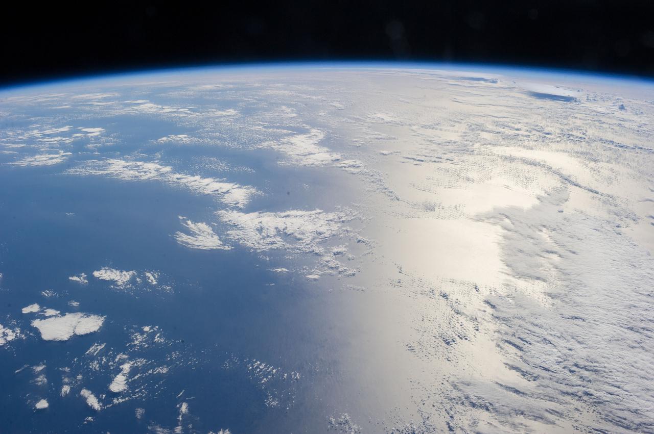 Earth observations taken by Expedition 38 crewmember.  Earth limb is visible.  Image was released by astronaut on Twitter.