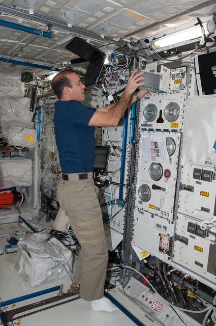 NASA image: Mastracchio assembles the Experiment Container in the Columbus Module