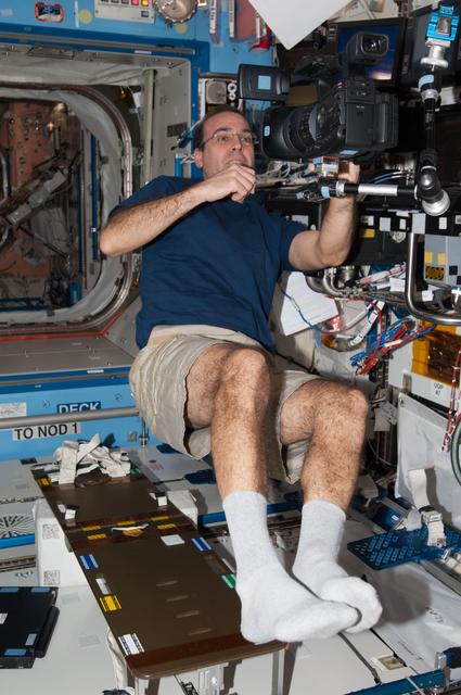 NASA image: Hopkins works with video camera