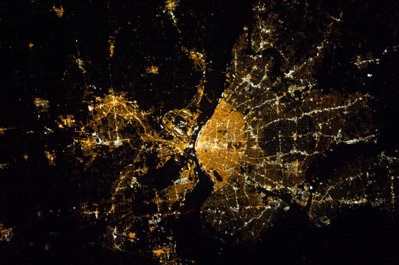 ISS038-E-024442 (7 Dec. 2013) --- One of the Expedition 38 crew members aboard the Earth-orbiting International Space Station photographed this night image of St. Louis, Missouri and East St. Louis, Illinois and surrounding area on Dec. 7, 2013. North is at the bottom of the picture, with the Mississippi River separating Missouri on the right (west) and Illinois on the east (left).  Belleville, Illinois is also visible.