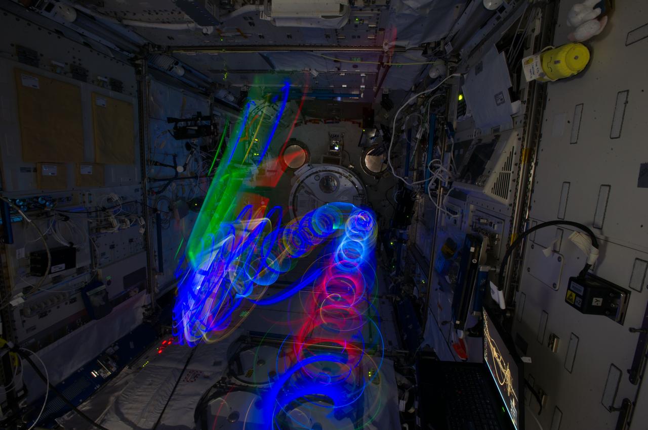 iss038e024991 (1/14/2020) --- View of light spirals from the Education Payload Observation (JAXA-EPO) experiment Spiral Top which aims to record the motion of a spinning top onboard the International Space Station (ISS). The photo was taken in the JAXA Experiment Module (JEM) Pressurized Module (JPM) aboard the International Space Station (ISS).