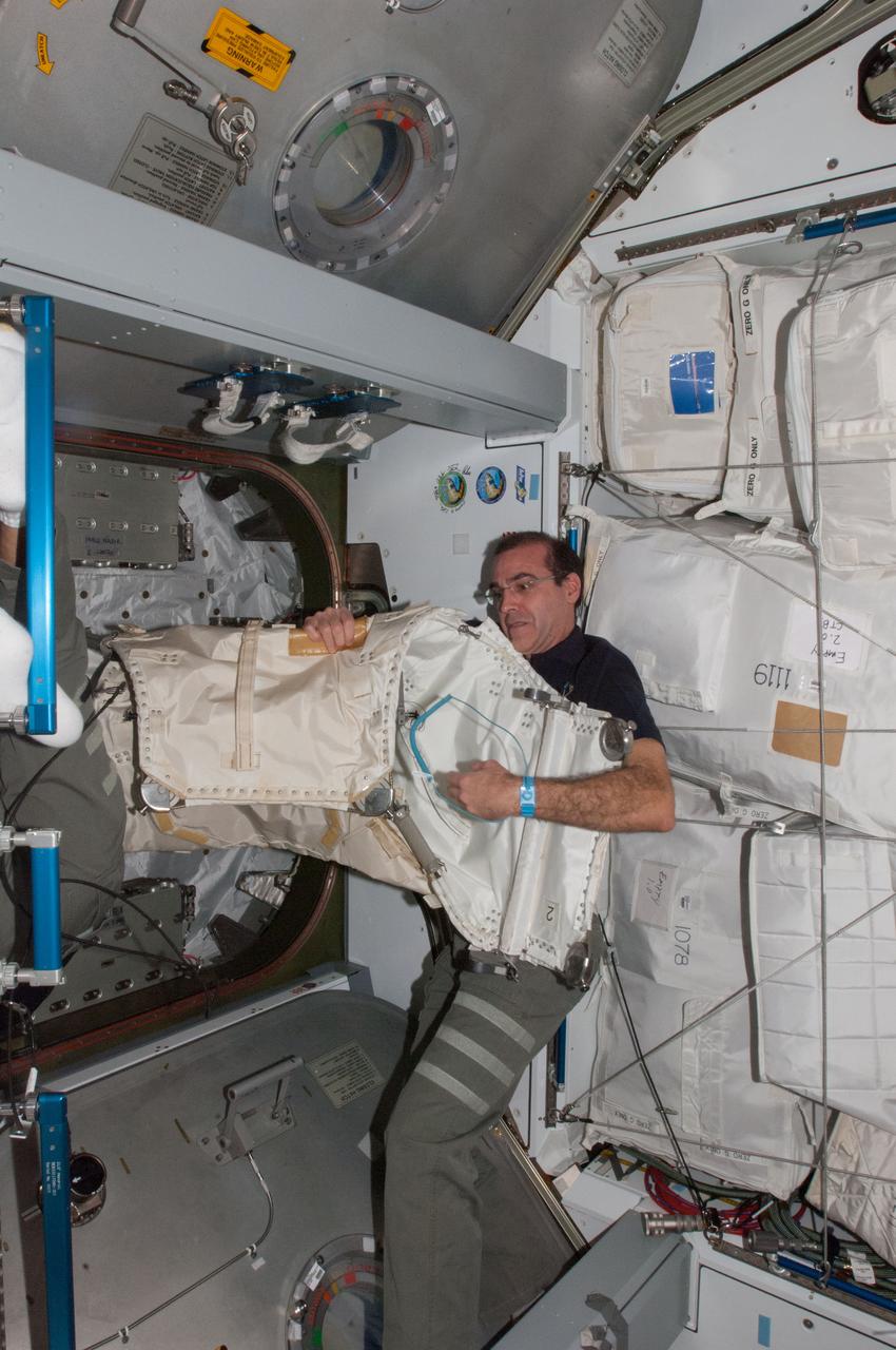 ISS038-E-031970 (12 Jan. 2014) --- NASA astronaut Rick Mastracchio, Expedition 38 flight engineer, is pictured during Cygnus cargo preparation in the Harmony node of the International Space Station.