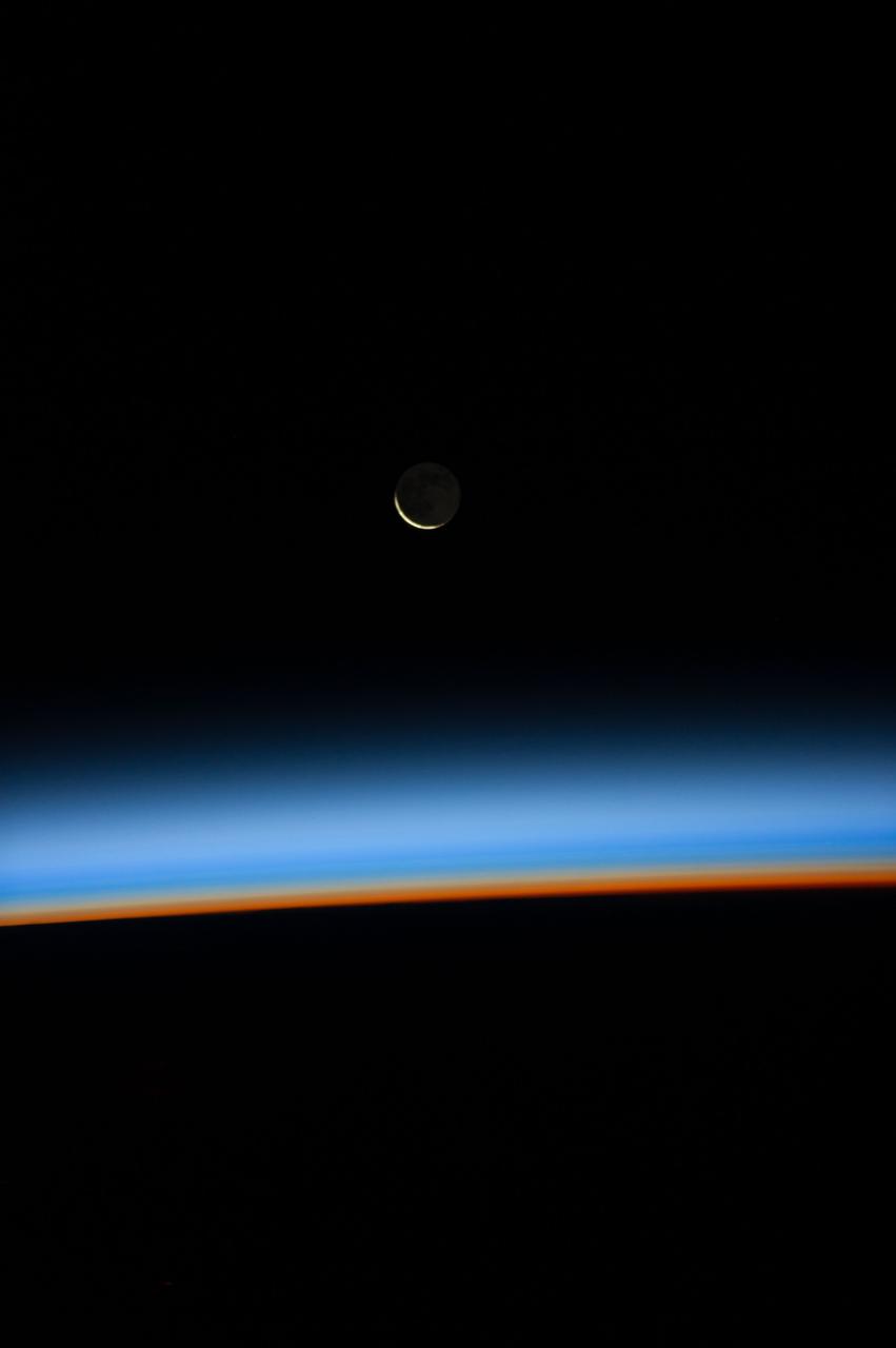 Night Earth Observations taken by Expedition 38 crewmember.  Moon is visible.  Image was released by astronaut on Twitter.
