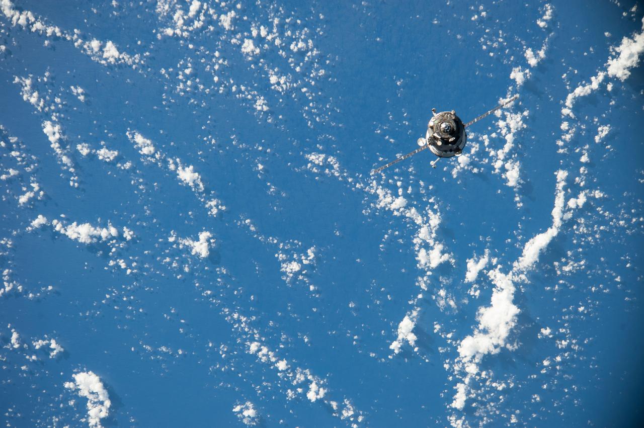 ISS038-E-042674 (5 Feb. 2014) --- An unpiloted ISS Progress resupply vehicle approaches the International Space Station, carrying 2.8 tons of food, fuel and supplies for the Expedition 38 crew members. The Progress 54 spacecraft launched from the Baikonur Cosmodrome in Kazakhstan at 11:23 a.m. (10:23 p.m. Baikonur time) and completed its four-orbit trek at 5:22 p.m. (EST) when it docked automatically to the station's Pirs docking compartment.