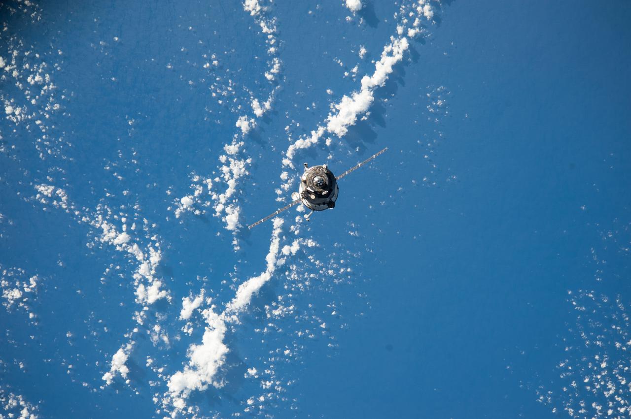 ISS038-E-042675 (5 Feb. 2014) --- An unpiloted ISS Progress resupply vehicle approaches the International Space Station, carrying 2.8 tons of food, fuel and supplies for the Expedition 38 crew members. The Progress 54 spacecraft launched from the Baikonur Cosmodrome in Kazakhstan at 11:23 a.m. (10:23 p.m. Baikonur time) and completed its four-orbit trek at 5:22 p.m. (EST) when it docked automatically to the station's Pirs docking compartment.
